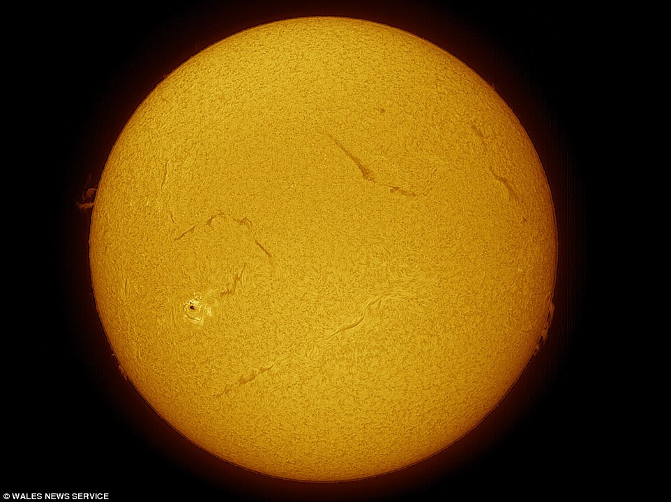 Sunspots have a temperature of anywhere from 2,700 to 4,200°C (4,890 to 7,590°F), compared to 5,500°C (9,930°F) for the surrounding solar material, which is why they are so visible. Sunspots are also sometimes the source of eruptions on the sun, namely solar flares
