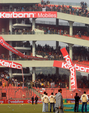 Irate fans tear down advertising banners at the Feroz Shah Kotla  after the match was abandoned, India v Sri Lanka, 5th ODI, December 27,  2009