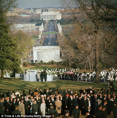 Tributes: Leaving Washington and the Lincoln Memorial behind, the 3 mile long Kennedy funeral procession makes its way toward Arlington Cemetery