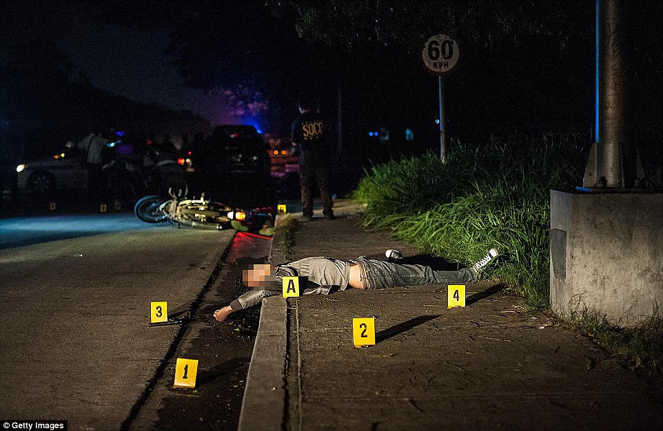 A crime scene shows where an alleged drug dealer was killed last month. Philippine police said they had killed 550 drug suspects while arresting nearly 8,000 others since the May election