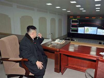 North Korean leader Kim Jong-Un smokes a cigarette at the General Satellite Control and Command Center after the launch of the Unha-3 (Milky Way 3) rocket carrying the second version of Kwangmyongsong-3 satellite at West Sea Satellite Launch Site in Cholsan county, North Pyongan province in this December 12, 2012 file photo, released by the North Korea's KCNA news agency in Pyongyang December 13, 2012. REUTERS-KCNA