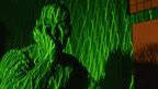 Man in green light