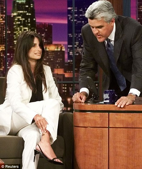 Tattooed lady: Penelope shows U.S. chat show host Jay Leno the 883 tattoo on 