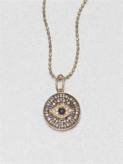 This is an authentic david yurman tigers eye spiritual beads necklace. Sydney Evan Diamond & 14K Gold Small Evil Eye Medallion