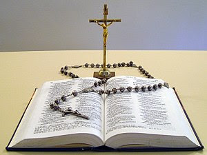 English: Christian Bible, rosary, and crucifix.
