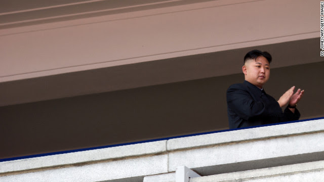 Kim Jong Un applauds as he watches a military parade in Pyongyang on April 15, 2012.