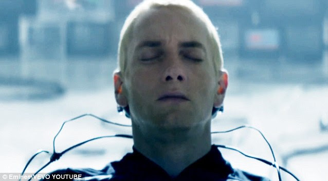 Too much information: Eminem was depicted with cables attached to the back of his head downloading information