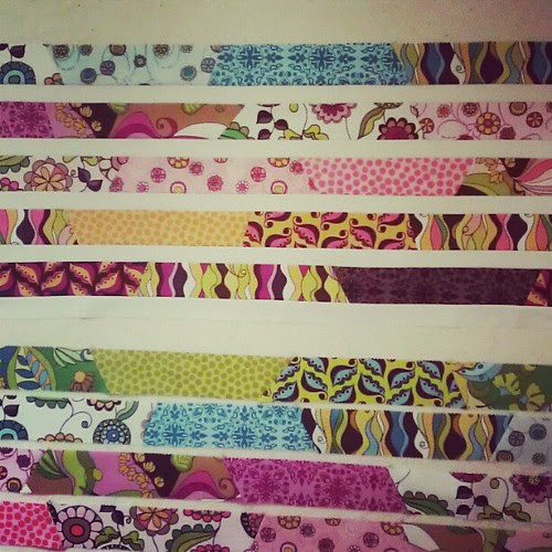 The top half is done. I'm too tired to keep sewing... my pauses keep getting longer and longer. That and I'm running out of white, guess I'll HAVE to but more fabric now. ;)