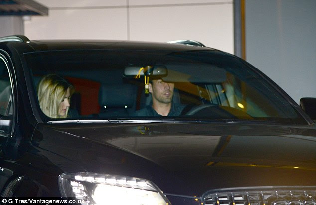 Arrival: Sergio Busquets turns up with his partner to the Fabregas bash