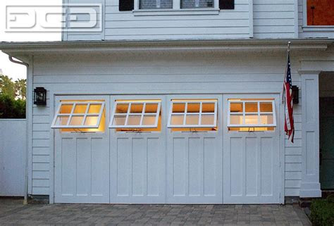 Your garage door is an integral part of your home. Swing Open Carriage Garage Door Conversion With Functional