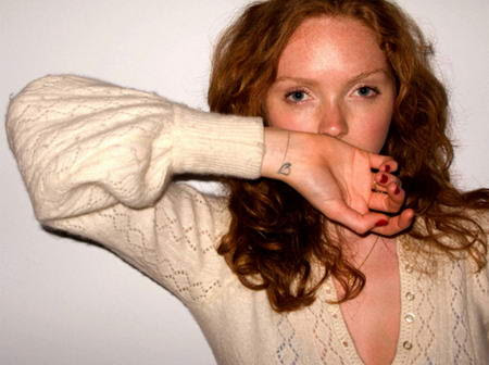 Scott Campbell Tattoos Lily Cole Right arm heart tattoo