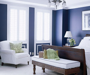 dark blue bedroom with molding