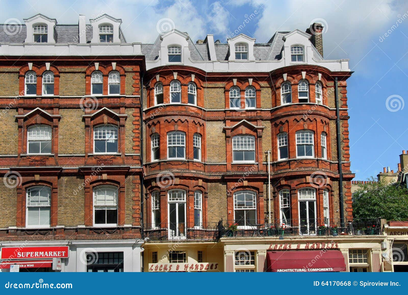 london old fashioned apartment building shops 64170668