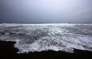 Waves break on the beach in Boca de Pascuales, Colima …