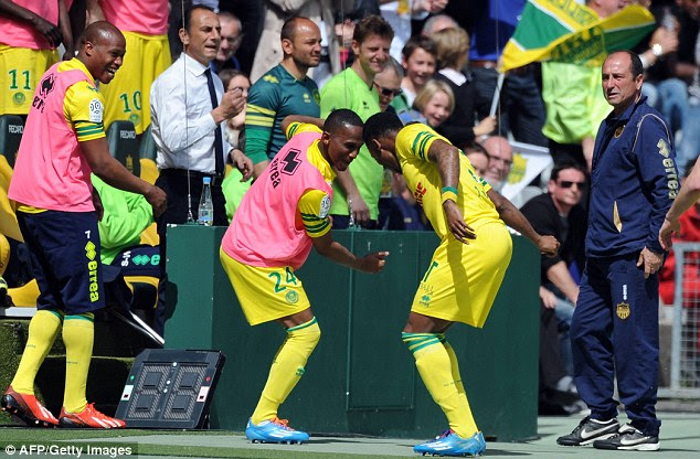 Joy: Nantes duo Serge Gakpe and Chaker Alhadhur celebrate