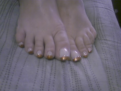 Creative toe nail art. French pedicure design with beautiful toe nail art