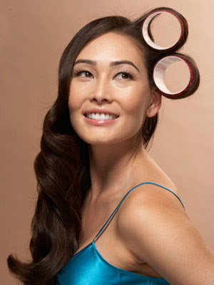 model with curlers in hair