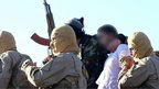 Photo posted online by Raqqa Media Center purportedly showing Jordanian pilot captured by Islamic State militants near the Syrian city of Raqqa (24 December 2014)