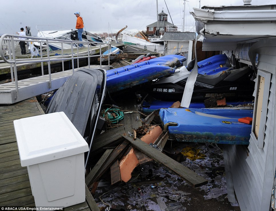 Tossed around like toys: Boats like crumpled in a heap in a harbour on the south shore of Staten Island