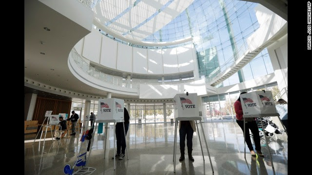 People vote inside the City Hall rotunda in San Jose, California.