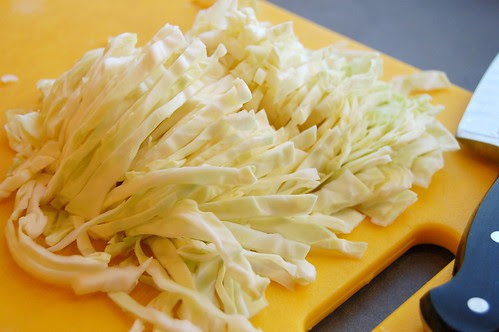Cutting cabbage to sautee for the rumbledethumps by Eve Fox, Garden of Eating blog, copyright 2011