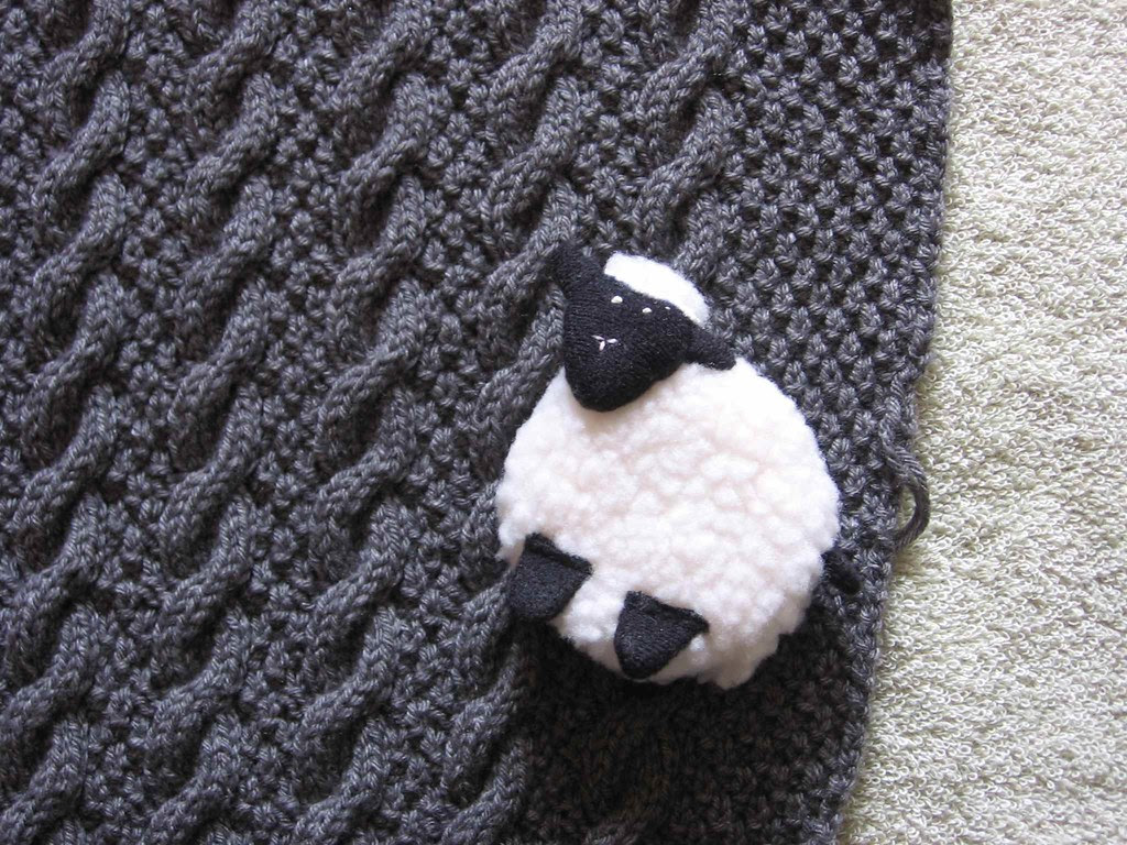 Cabled vest sweater detail