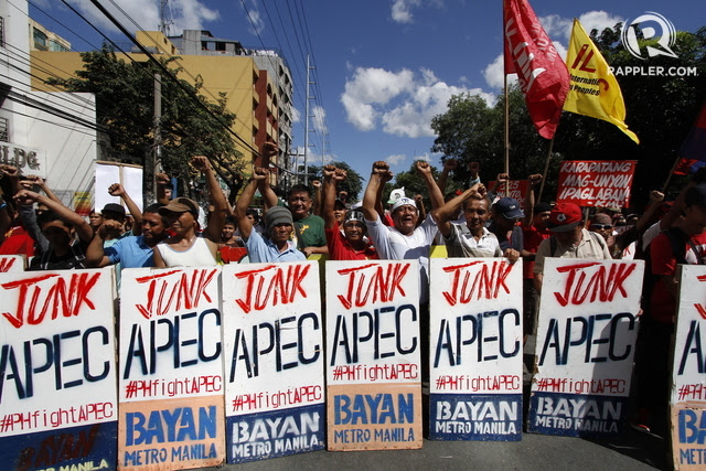 ANTI-APEC. Police blast Katy Perry's 'Roar' from speakers to disperse a rally during the APEC summit. In the photo, Militants stage their anti-APEC Protest along Gil Puyat Ave. Mark Z. Saludes/Rappler.com 