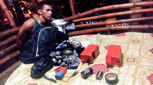 APPREHENDED. Roy "Steve" Bulat-Ag Moreno is arrested for illegal possession of explosives. Photo from Task Force Davao  