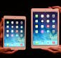 The new 'IPad Mini' on the left and the new 'IPad Air' on the right.   The Apple Mac Media launch tonight in King's Cross, London.   Media representatives browse the new mac updated products.    . REXMAILPIX.
