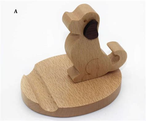 The ability to charge without wires is now coming to the iphone, though not from apple. Wooden Dog Shaped Mobile Phone iPad Holder Stand - FeelGift