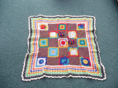 I hope Salma likes this one. Her squares are included. A combination of Knitted and Crocheted, perfect border! Thank you!