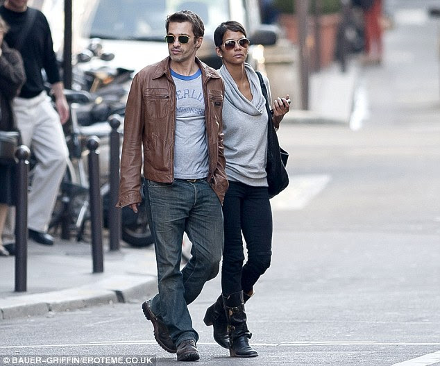 Romance in Paris: Halle Berry and Olivier Martinez were pictured strolling through Paris over the weekend