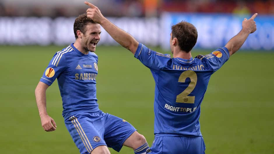 Chelsea's Juan Mata, left, and Branislav Ivanovic, celebrate at the end of the Europa League final soccer match against Benfica in Amsterdam, Netherlands on Wednesday. Chelsea defeated Benfica 2-1.
