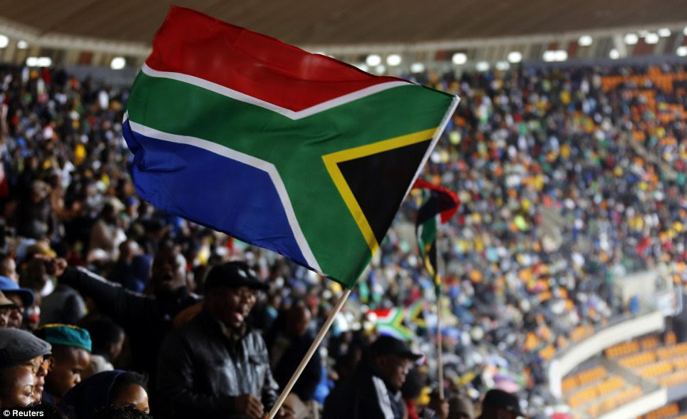 Unity: Mandela is loved by South Africans for his efforts to transform the racially divided country into the 'Rainbow Nation'