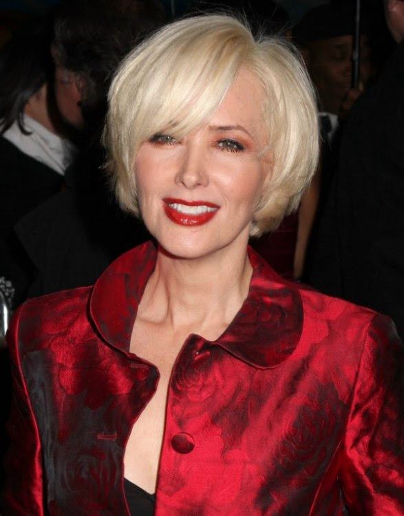 Janine Turner's hair cut into a blonde chin length bob