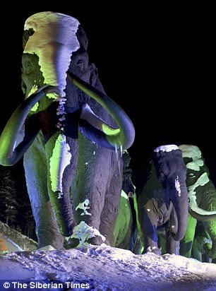 Shown are mammoth statues in Khanty-Mansiysk