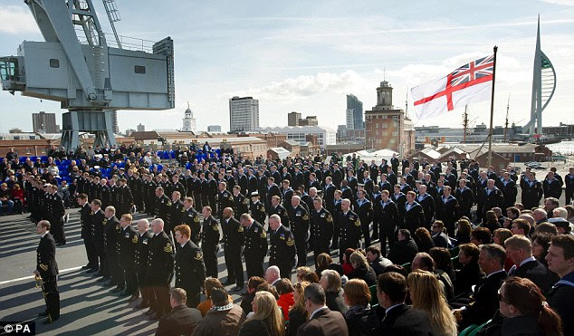 The big send-off: The last remaining sailors serving on board the warship bade farewell to it in an emotional ceremony