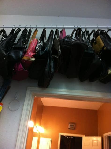 purses hung shower curtain rodhooks closet
