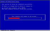 With the system files freshly copied and the Registry ready for rebuilding, the system needs to reboot. Remove the CD from the drive so that the PC will boot to the hard drive instead of to the CD.