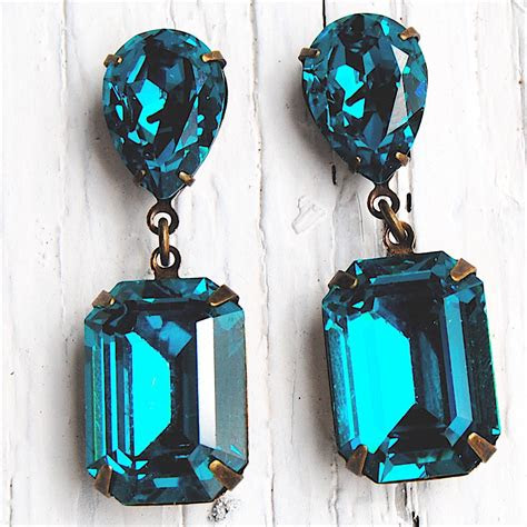 Stay awhile at 29 palms inn, located on the oasis of mara in california's high desert. Teal Peacock Earrings Teal Diamond Earrings Fiesta Dangle