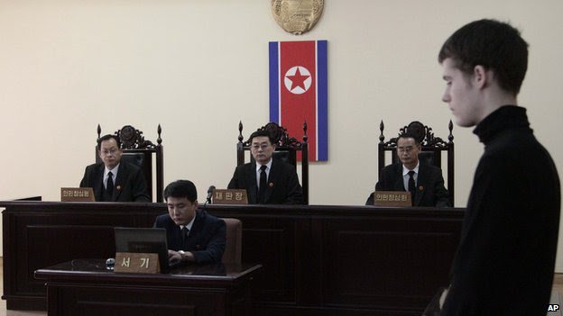 Matthew Miller stands during his trial at the Supreme Court in Pyongyang, North Korea, 14th Sept 2014