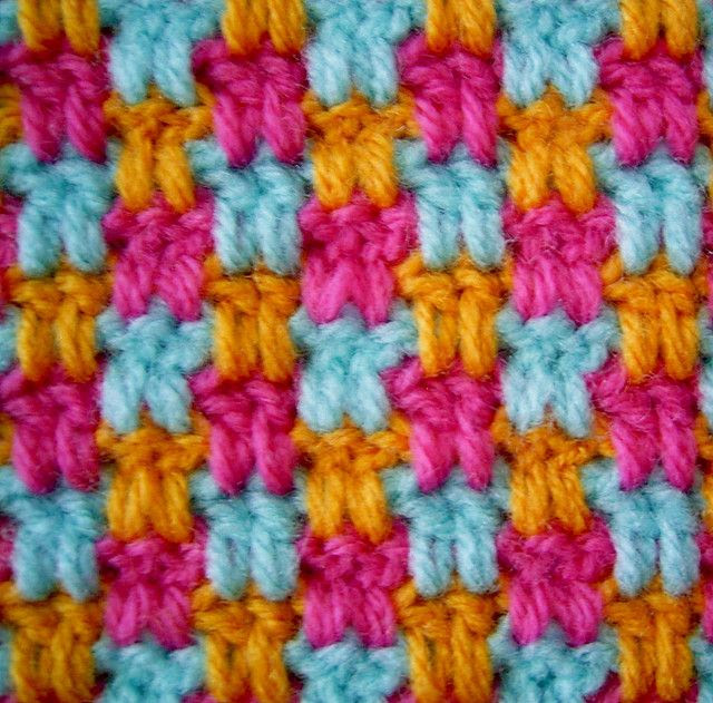 . . . instead of crocheting into the space, you crochet into the stitch two rows below. very cool.