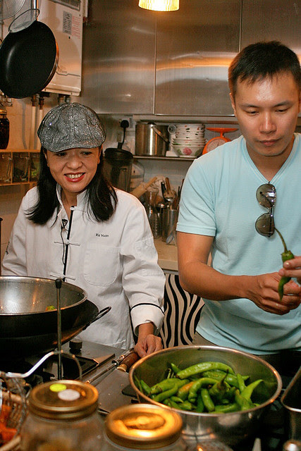 Margaret looks pleased with her assistant du jour. Darren is plucking the stems off the chillies.