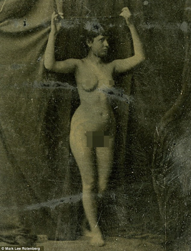 Vintage pin-ups: Long before mainstream photographic film was pioneered by George Eastman, women have been used in erotic-themed images - since as early as 1860 (pictured)