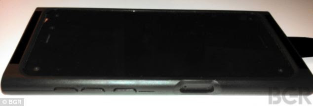 The handset is shown in a special protective case to shield its final design. However, the four cameras are clearly visible in each corner