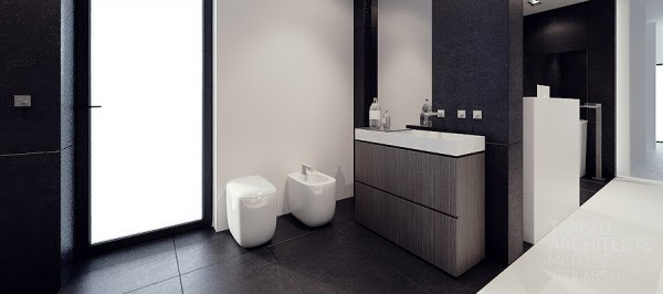 The final images come from an exhibition entitled "our bathroom" that took place in Lodz. The design fully embraces the black and white aesthetic with clean, smooth white porcelain and textured black walls. Chrome fixtures complete the modern look in their ultimate simplicity.