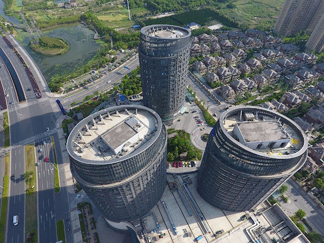 Chinese architecture fans toast 'beer keg' tower blocks in Suzhou