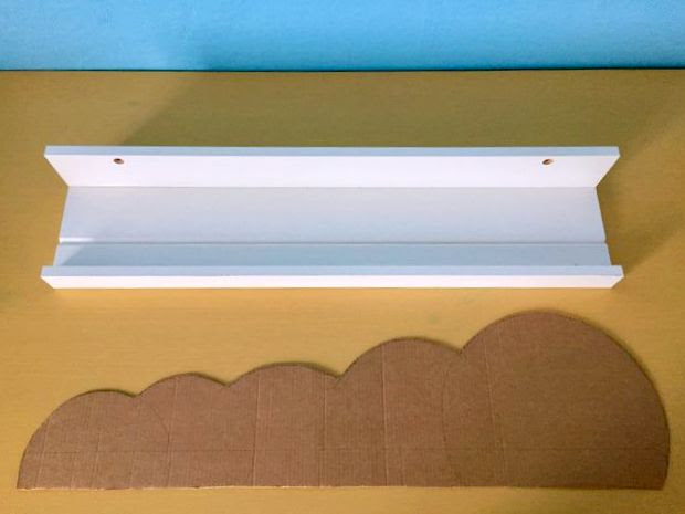 A kid's bookshelf with customised front