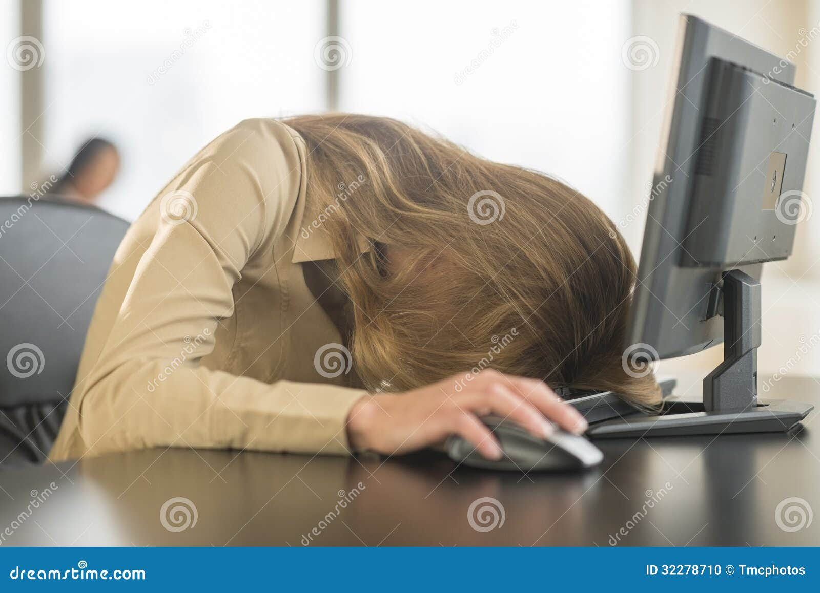 tired businesswoman head keyboard young computer desk office 32278710