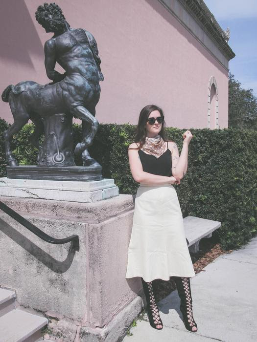 White skirt and over the knee boots